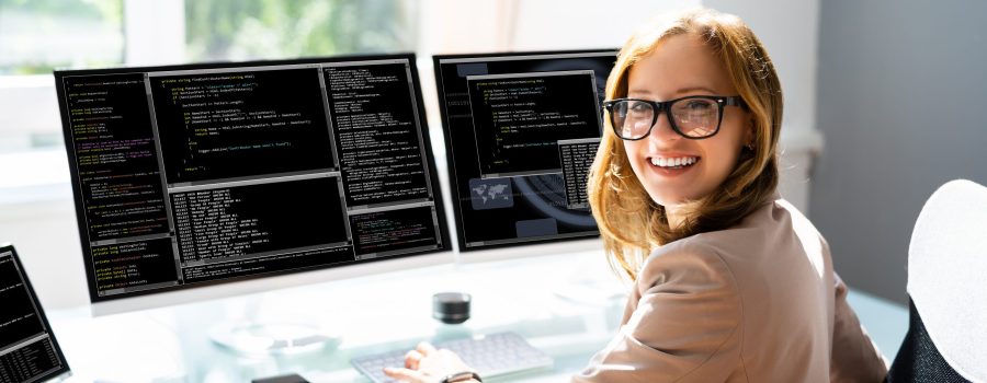 Programmer Woman Coding On Computer. Coder Girl