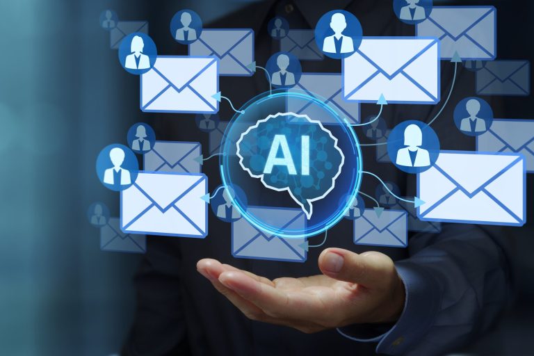 AI-powered email marketing solution. AI-optimized and personalized mail writing. Businessperson holding artificial intelligence icon.